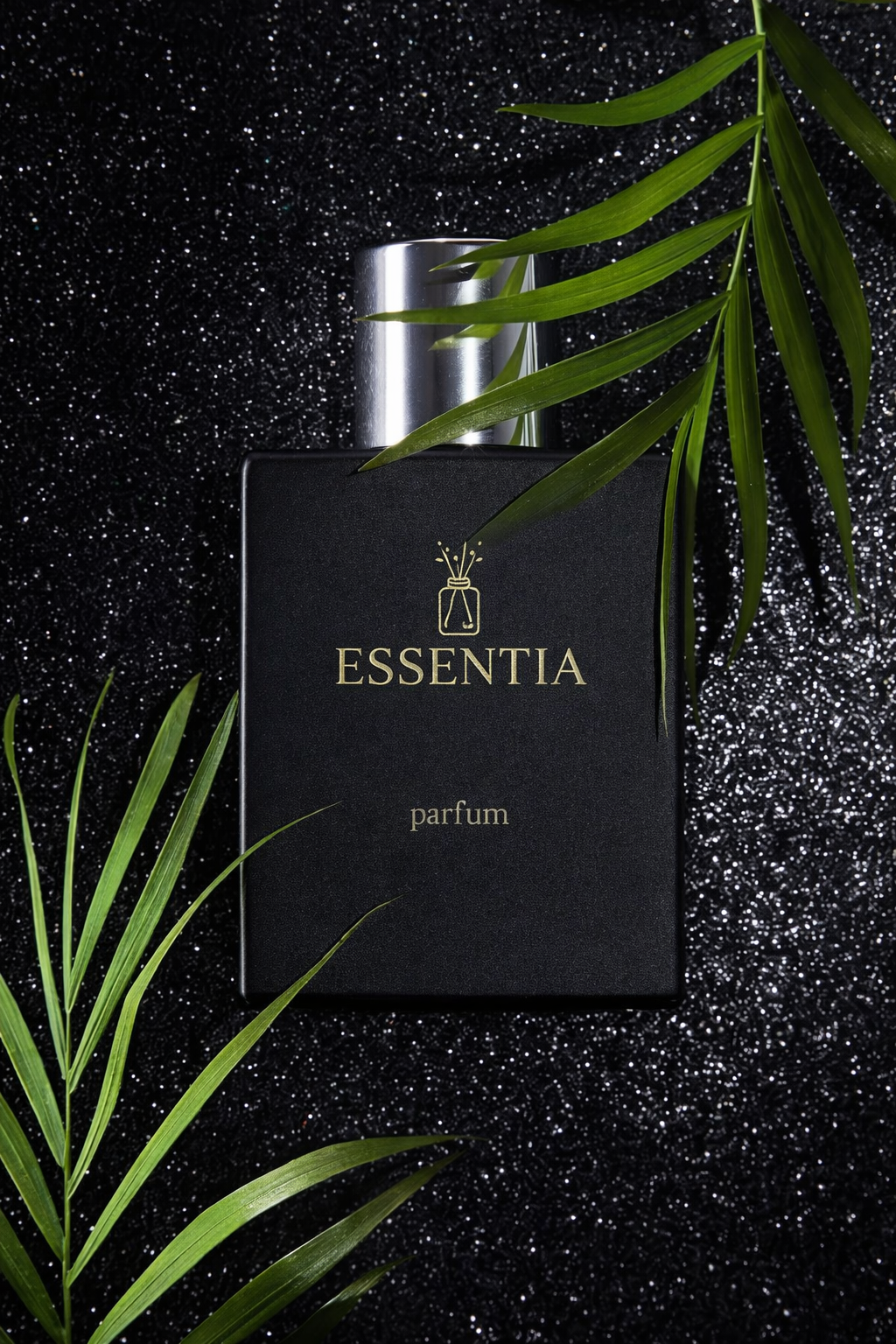 Essentia black bottle with silver cap floral fruity fragrance for women on glittery black background