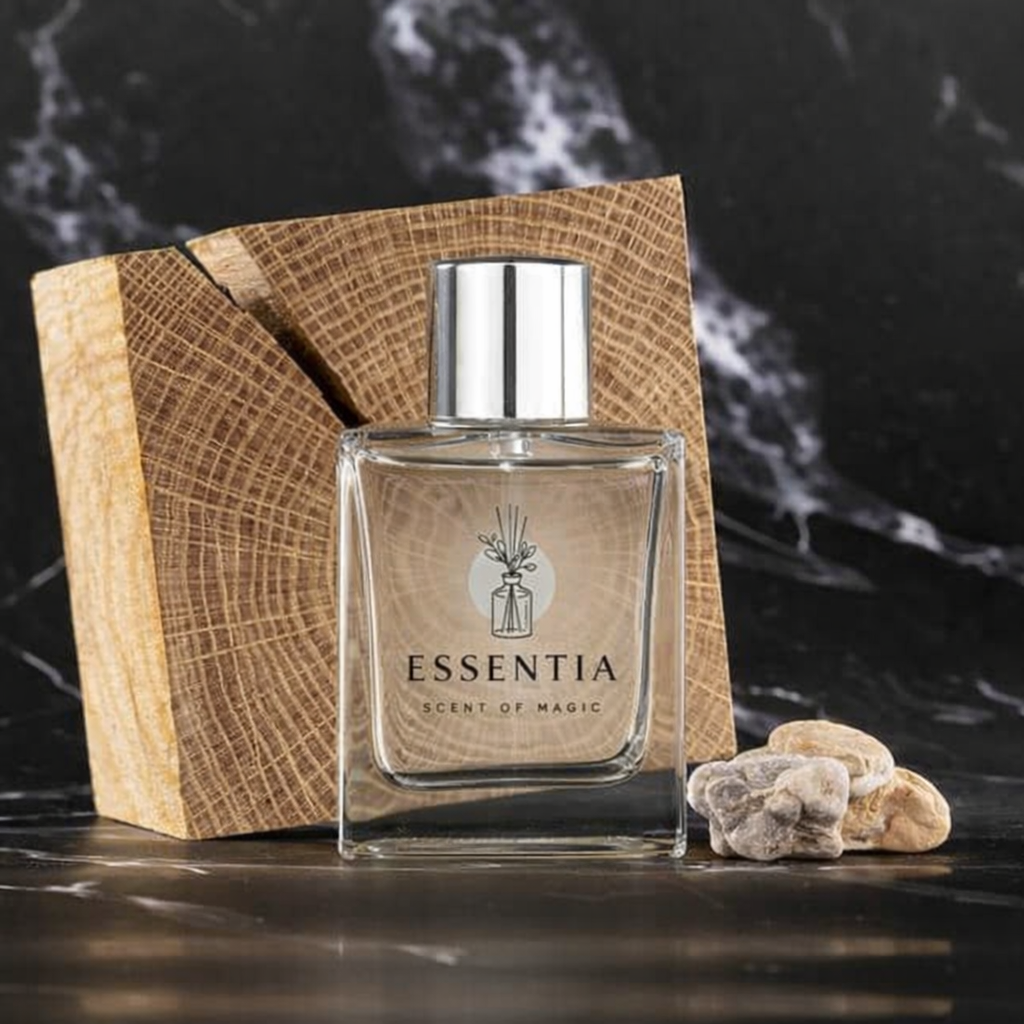 Essentia perfume bottle with wood block and stones featuring tiger woods warm-up routine scent
